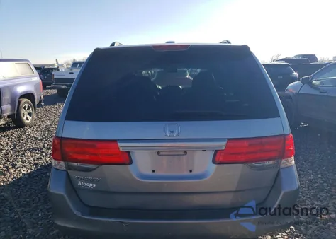 2010 Honda Odyssey Exl z USA, uszkodzony, nr VIN 5FNRL3H60AB042292